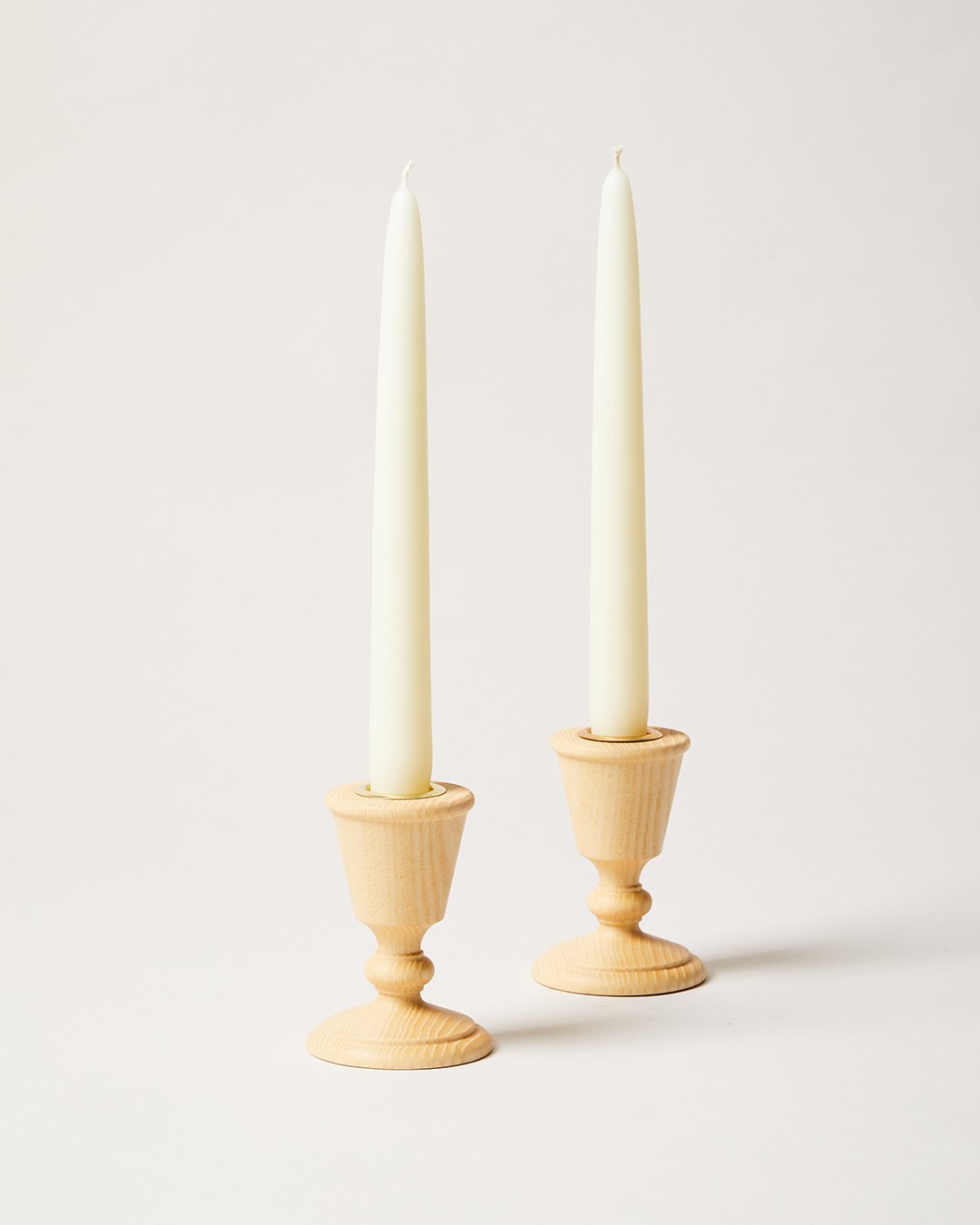 studio image of pair of countryman candlesticks, natural