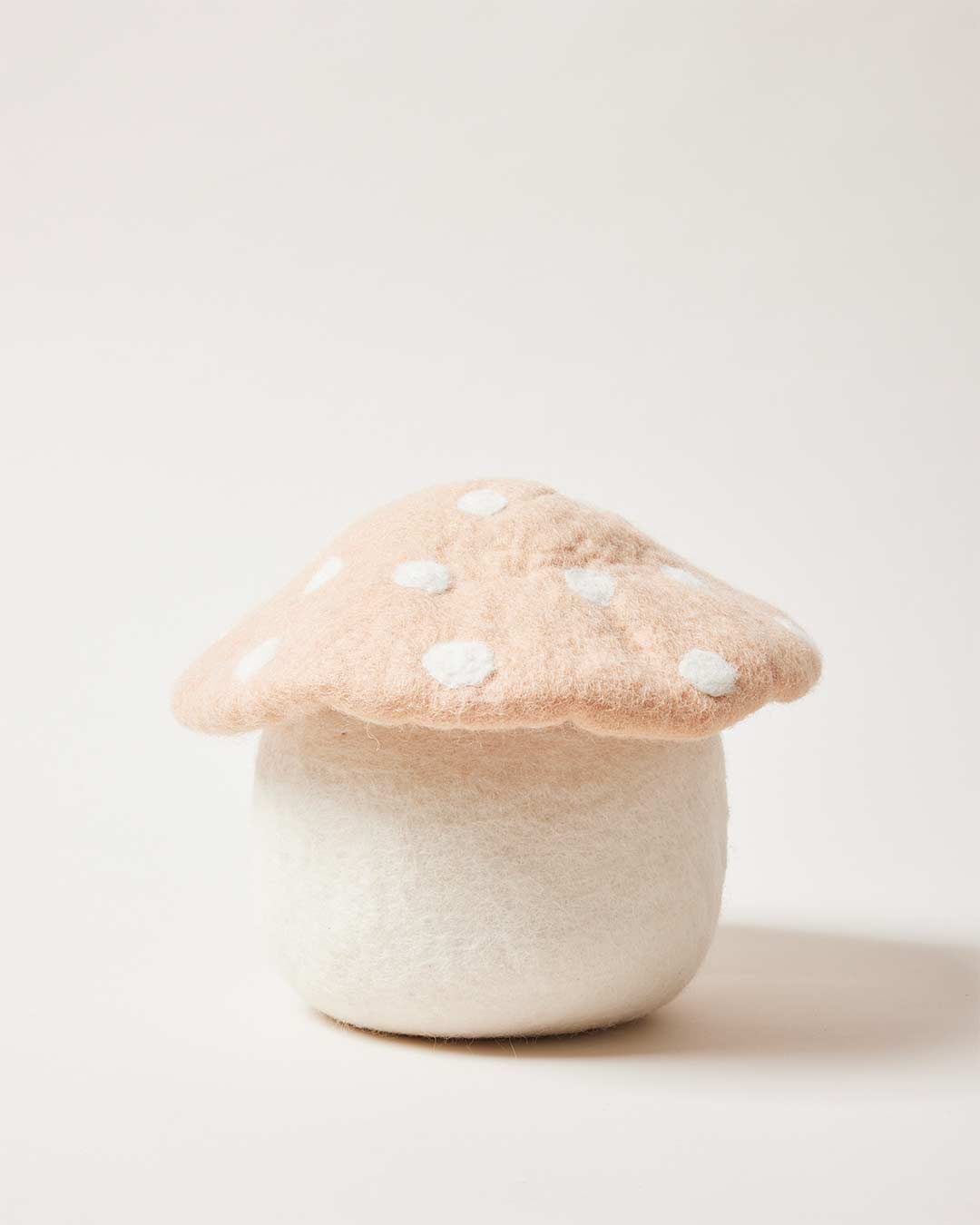 Farmhouse Pottery artisan felted mushroom doorstop blush.