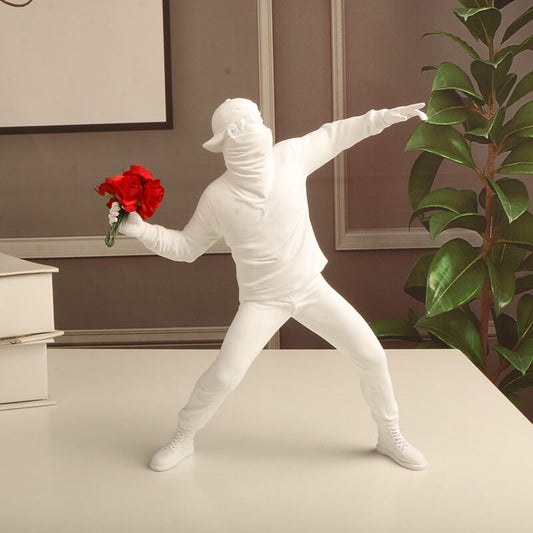 man throwing roses