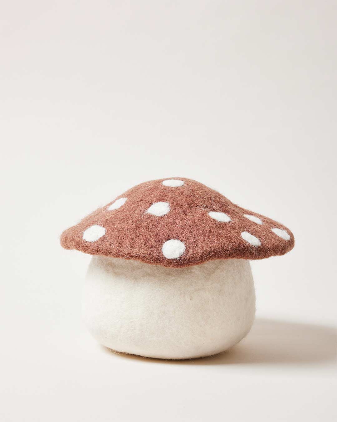 Farmhouse Pottery artisan felted mushroom doorstop brown.