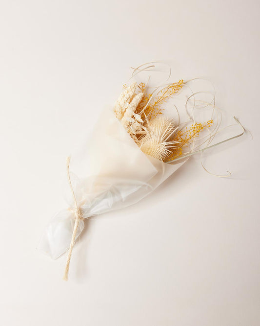 Crafted floral arrangement from dried flowers - in natural